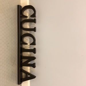 CUCINA sign